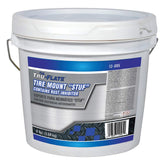 Tru-Flate Stuf concentrated tire lubricant in 8 lb pail for easy mounting and reduced friction.