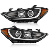 TTUN AUTO Elantra driver-side headlight close-up showing projector design for sharper nighttime visibility