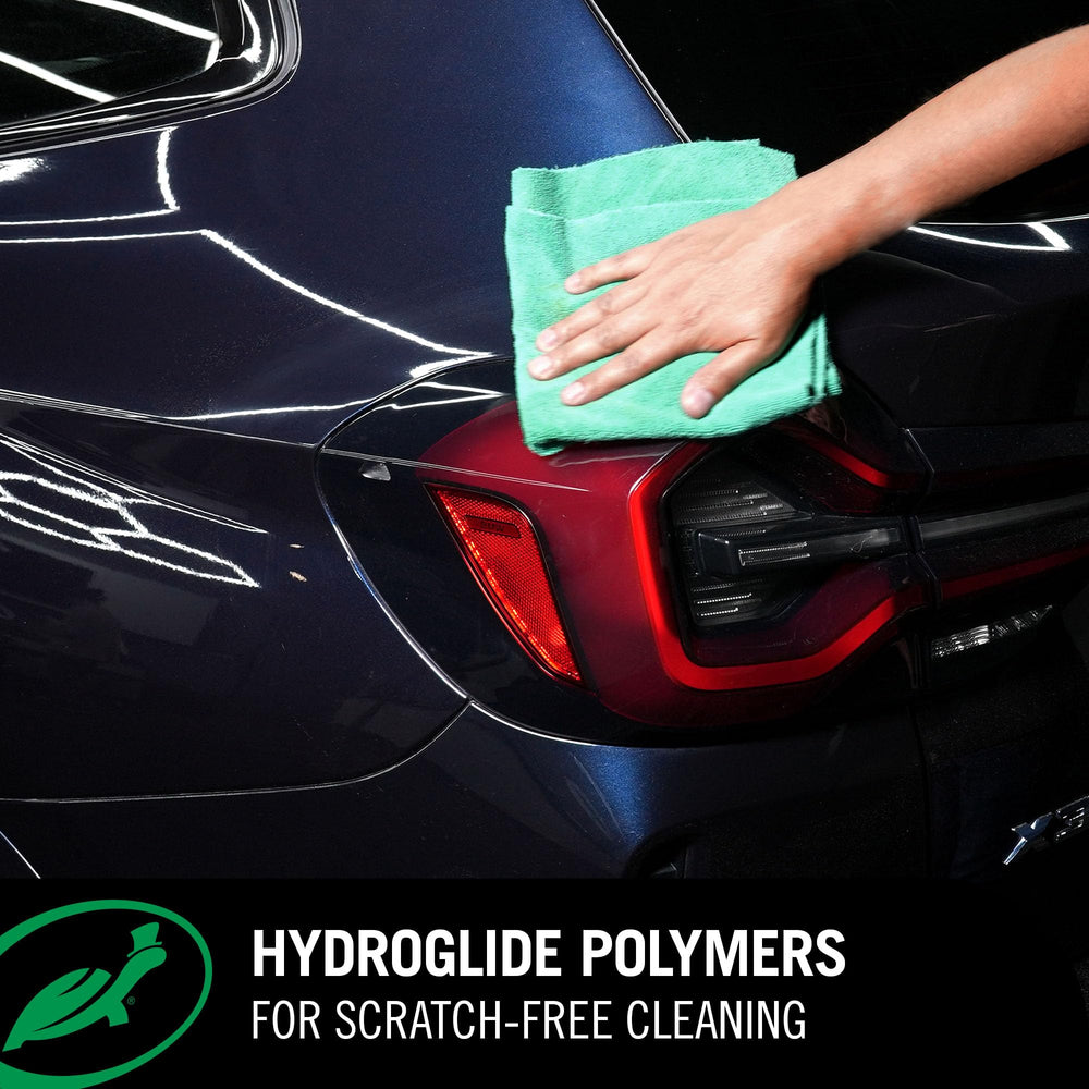 Turtle Wax beading water on treated surface shows protection.