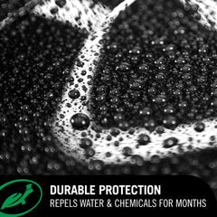 Turtle Wax Hybrid Solutions water beading on a black surface demonstrates protection.