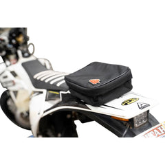 Tusk Fender Pack secure-attachment-system keeps contents stable on rough terrain.