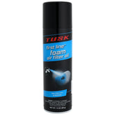TUSK First Line foam oil bottle pouring on a foam filter to boost dust capture.