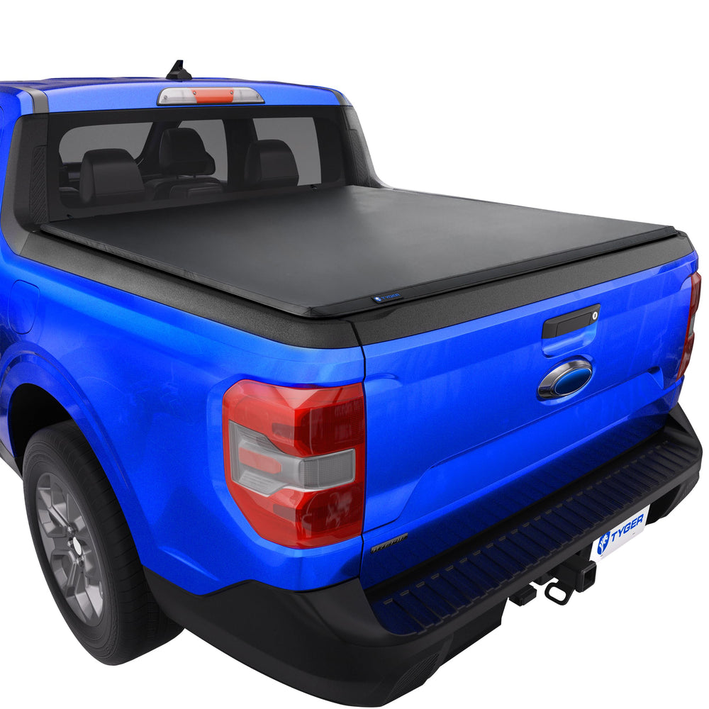 Tyger Auto T3 soft tri-fold cover closed over Maverick bed protecting cargo.