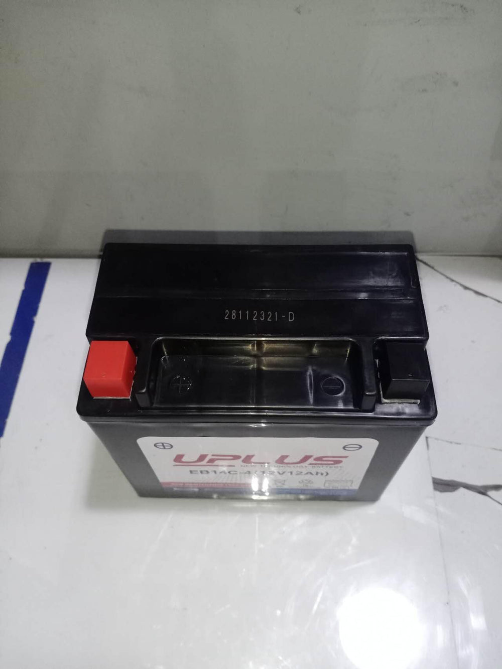 UPLUS YTX14-BS side view illustrates compact 12V 12Ah capacity.