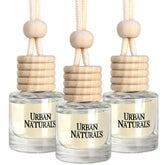 Urban Naturals Rouge 54 bottle with wooden cap showcases premium design for long-lasting scent.
