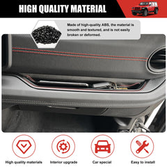 Passenger-side storage tray keeps essentials within easy reach.