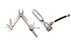 V1 Motor CO2 kit contents with tools for tubeless tire repairs.