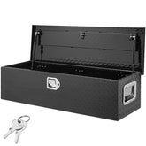 VEVOR toolbox on truck bed with diamond plate finish for secure tool storage.