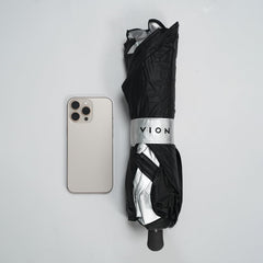 VION sunshade stored in door pocket for convenient access
