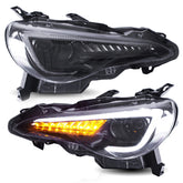 VLAND headlight assembly for FR-S front view enhances style and visibility.