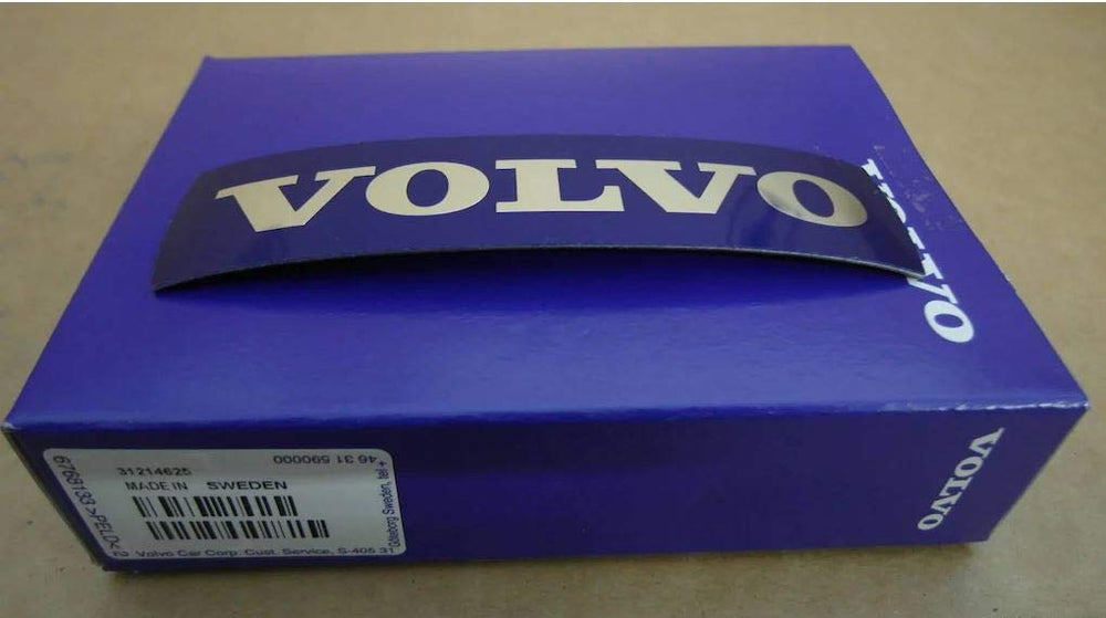 Volvo Genuine grille badge install guide image highlights easy application.