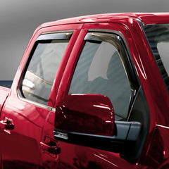 Voron Glass in-channel rain guard rear-left for Ford F-150, reduces rain splash while cruising.