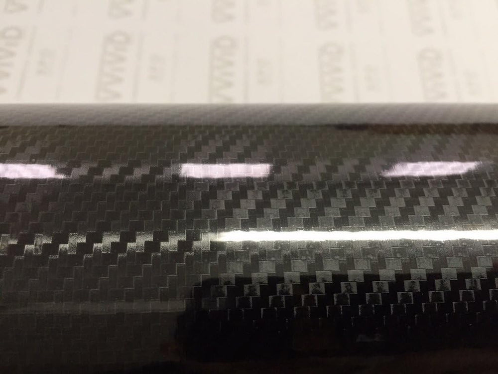 Close-up of glossy carbon finish and air-release adhesion