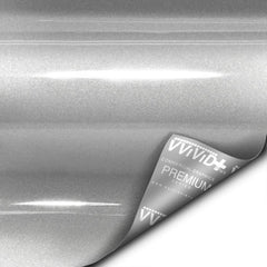 VViViD silver metallic finish on a car panel for a realistic look.