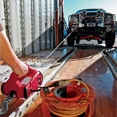 WARN PullzAll in use lifting a heavy object with controlled motion.