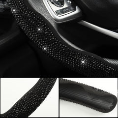 West Llama diamond bling on wheel at night highlights interior luxury.