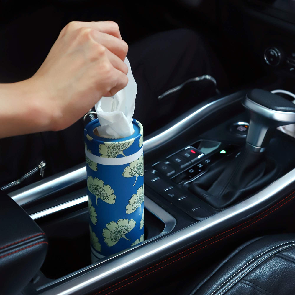 Tissues stored in car cup holder for easy access