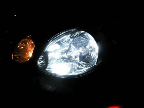 Xentec 9006 Ultra White bulb car headlamp for enhanced nighttime visibility.