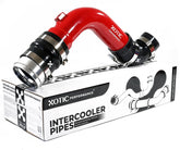 Xotic Performance turbo intercooler outlet pipe visible, engineered for smoother airflow in Ford 6.7L.