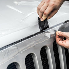 XPEL installation close-up shows a film with strong adhesion and seamless finish.