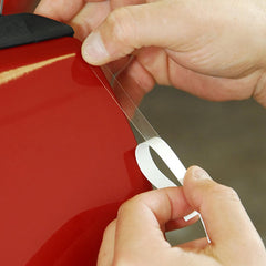 XPEL Door Edge Guard close-up on adhesive and clear wrap.