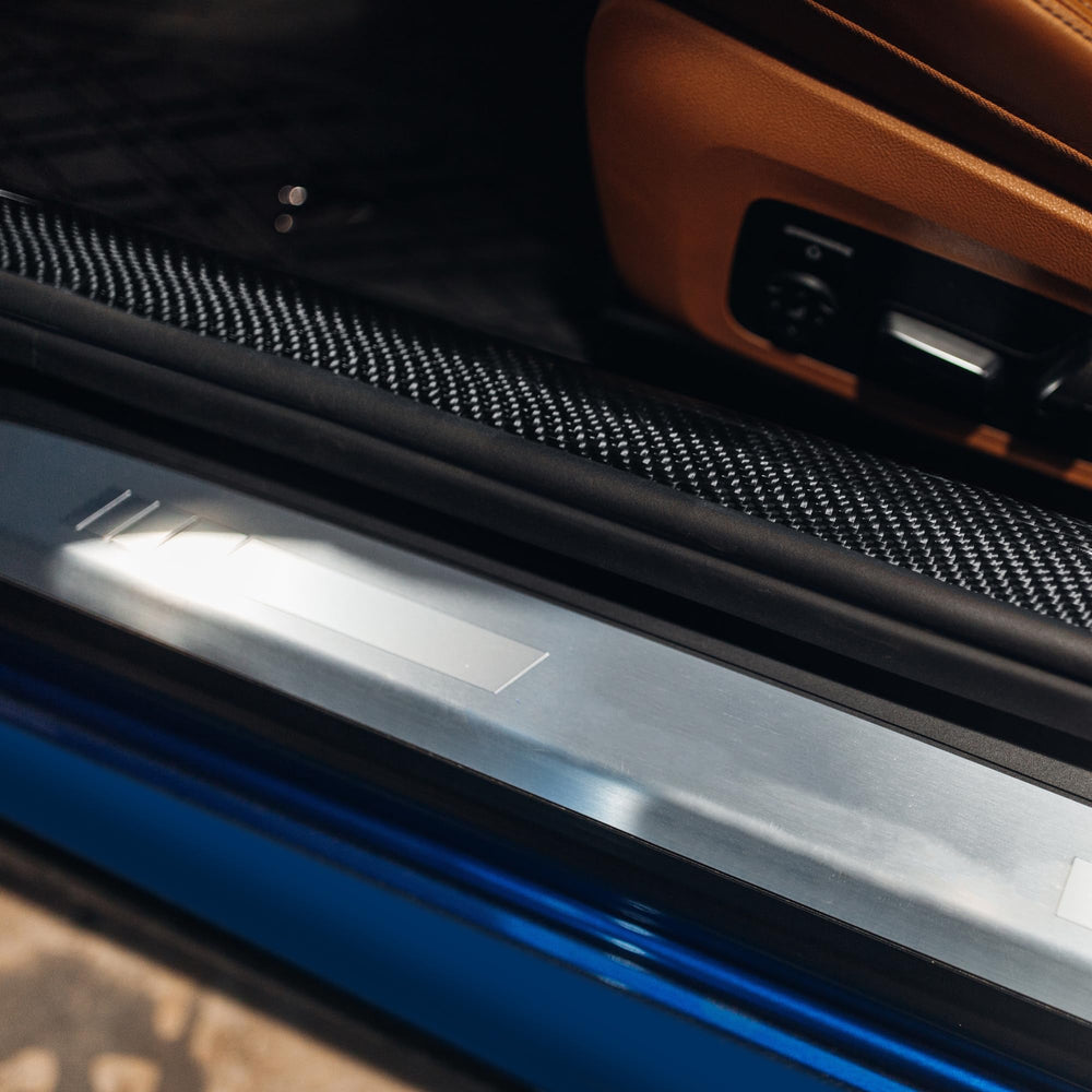 XPEL universal door sill guard protecting entry from everyday scuffs