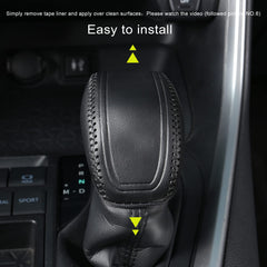 Installed YAKANEY black-trim leather gear shift cover on car console