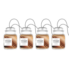 Yankee Candle Car Jar Ultimate Leather bottle releasing a true-to-life fragrance in a car interior