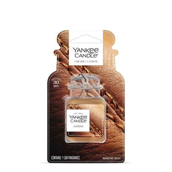 Yankee Candle Car Jar Ultimate Leather hanging for easy aroma in a vehicle