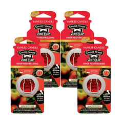 Yankee Candle Macintosh vent clips front view showing four-pack for easy fragrance replacement.