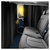 YGDMD divider curtain blocks glare and privacy inside the car.