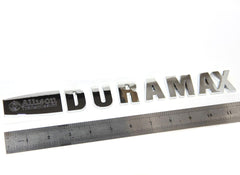 Close-up of adhesive-backed Yoaoo badges for durable mounting.