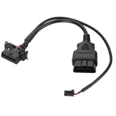 YOLLKY Security Gate Bypass OBD2 Cable attached to a RAM 1500 for quick diagnostics.
