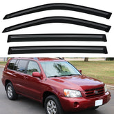 YQAUTEC out-channel window visors installed on Highlander for shade and airflow.