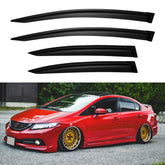 YQAUTEC window visors installed on a Civic for airflow and rain protection.