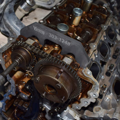 Camshaft screw removal tool for safe disassembly during timing tasks.