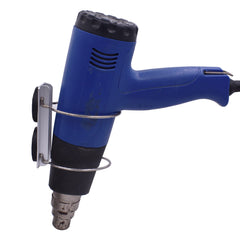 YYST magnetic heat gun holder mounted on ferrous metal for easy reach.