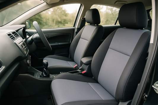 Freshly fitted neoprene car seat covers and matching steering wheel cover in a car interior, PlentyTorque