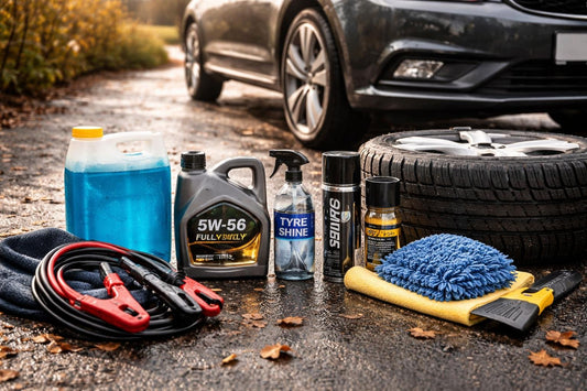 Seasonal car care essentials laid out on a driveway