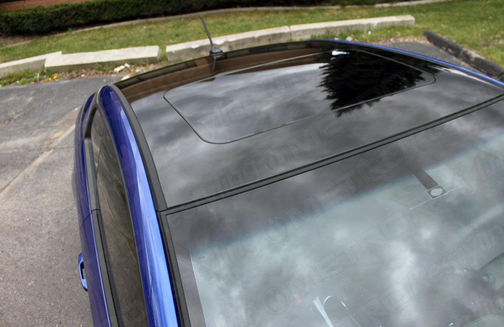 Close-up of 3M 2080 gloss black wrap with UV-protected coating for outdoor durability.