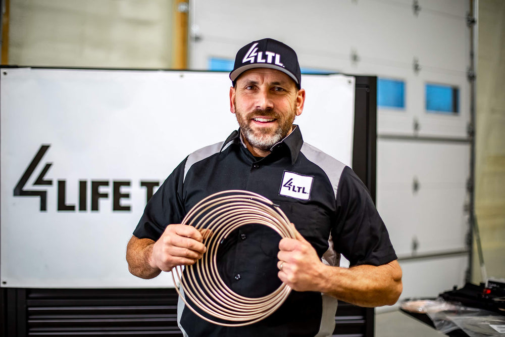 4LIFETIMELINES copper-nickel line unspooling on workbench for upgrade