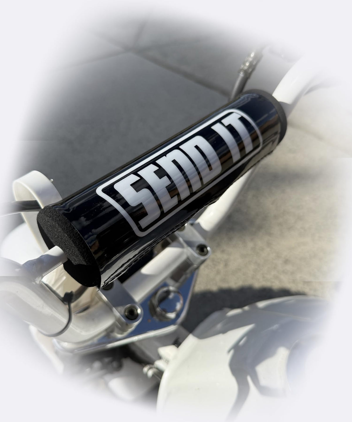 ThrottlePak SEND IT handlebar pad in black, front view for added protection