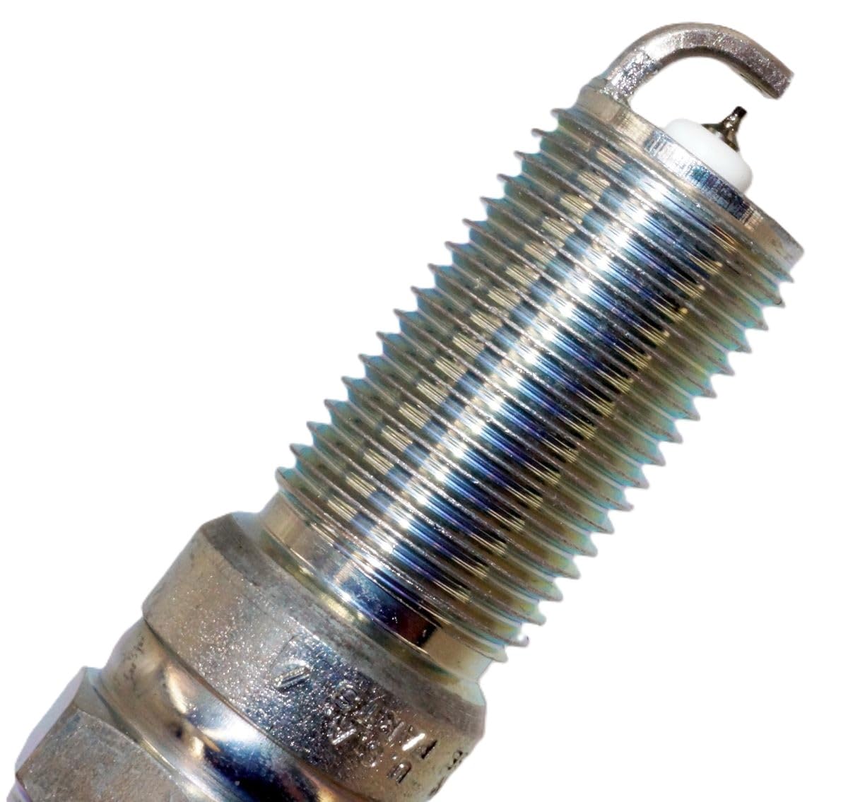 ACDelco spark plug in action in engine bay for quick, smooth starts.