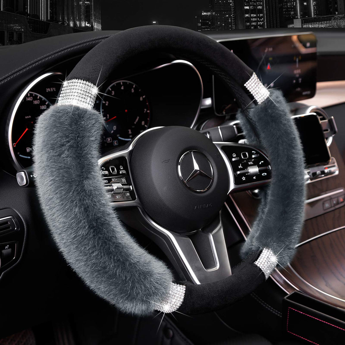 Achiou rhinestone fluffy steering wheel cover close-up with sparkling accents for style.