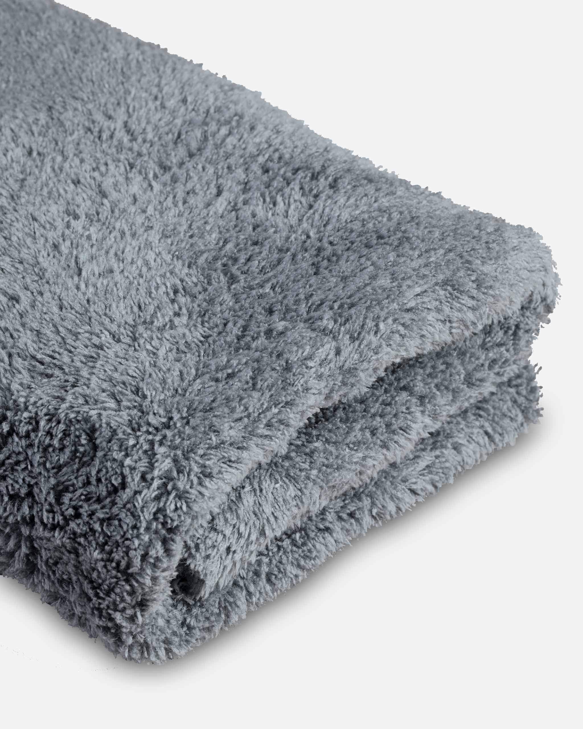 Adam's Borderless Grey Microfiber Towel dusting and drying on wheels.