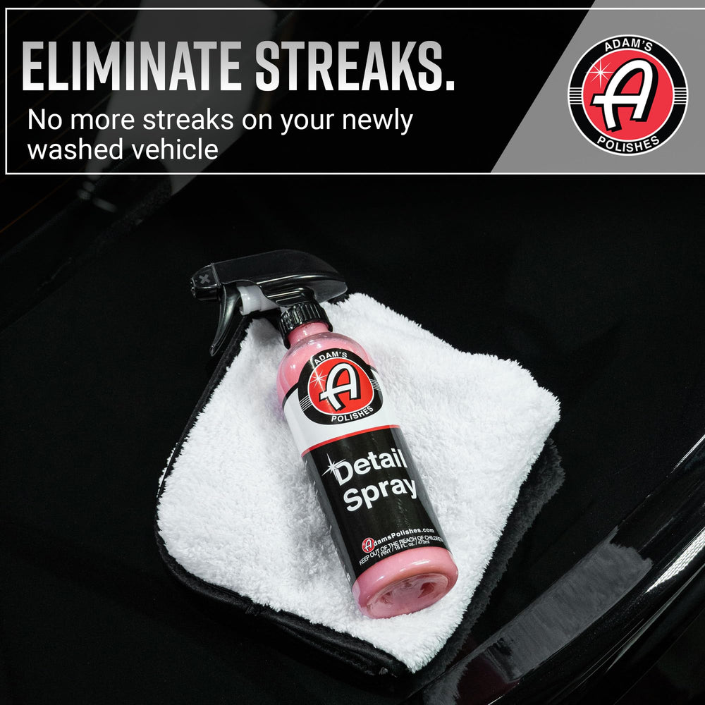 Adam's Detail Spray mist being wiped for a flawless finish.