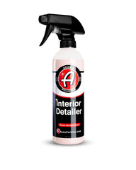 Adam's Polishes Interior Detailer bottle pour demonstrates an all-in-one cleaner and protectant.