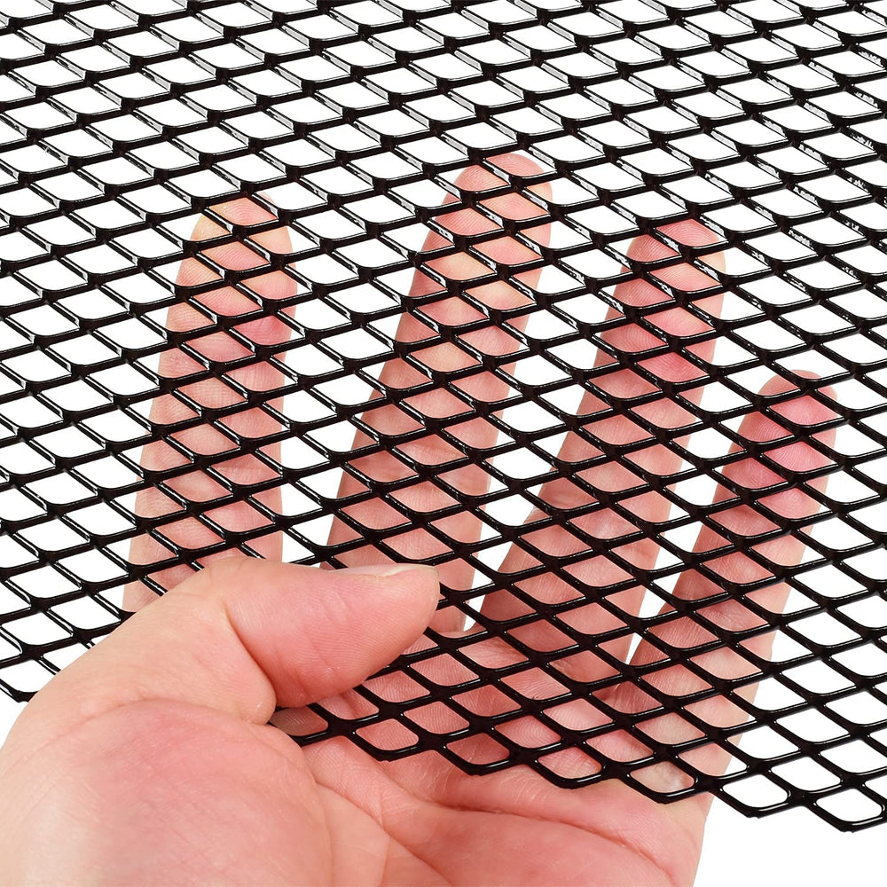 AggAuto aluminum grille mesh with rhombic holes guarding the radiator and boosting airflow.