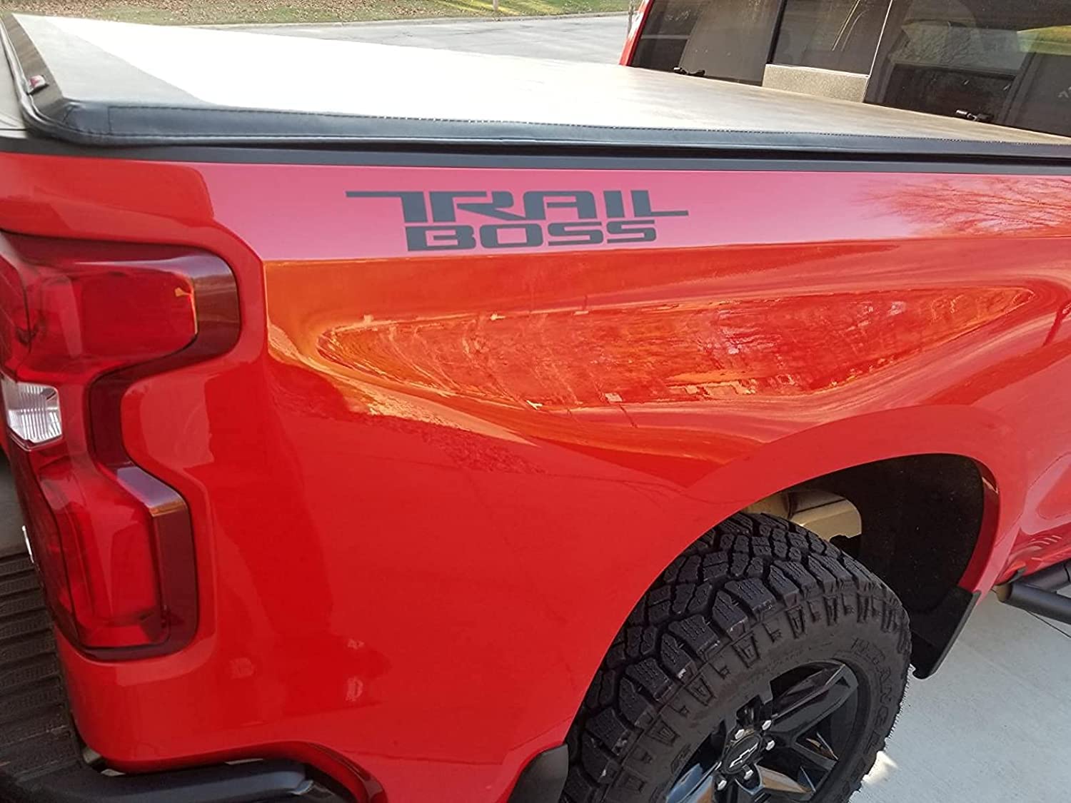 Aimoll Trail Boss bedside decal close‑up showing pre-applied film for precise alignment.