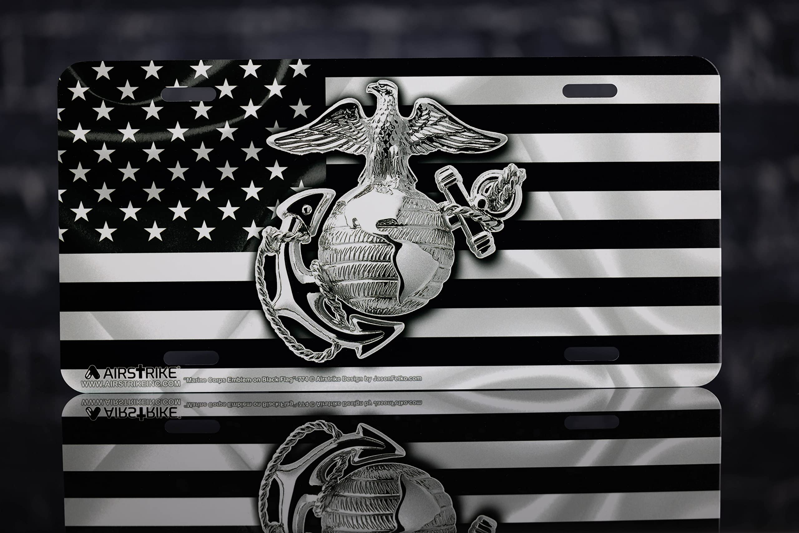 Airstrike USMC license plate shows a black flag design with bold colors for curb appeal.